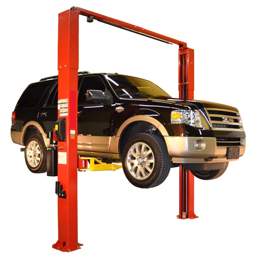 2-post car lift lifting a large SUV, designed for vehicle repairs and maintenance, ideal for garages and workshops in Canada.